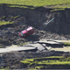 Illustration for article titled Giant Canadian Sinkhole Swallows Road, Home